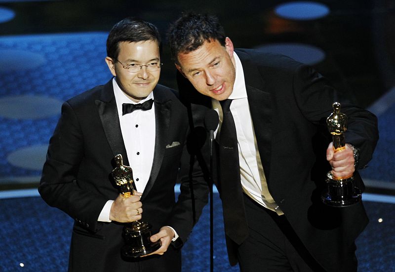 Tan and Ruhemann accept the Oscar for best animated short film for "The Lost Thing" during the 83rd Academy Awards in Hollywood