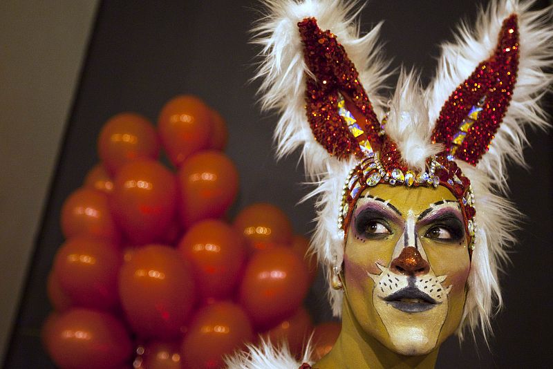 Participant Ikaro waits before a drag queen competition during carnival festivities in Las Palmas on the Spanish Canary Island of Gran Canaria