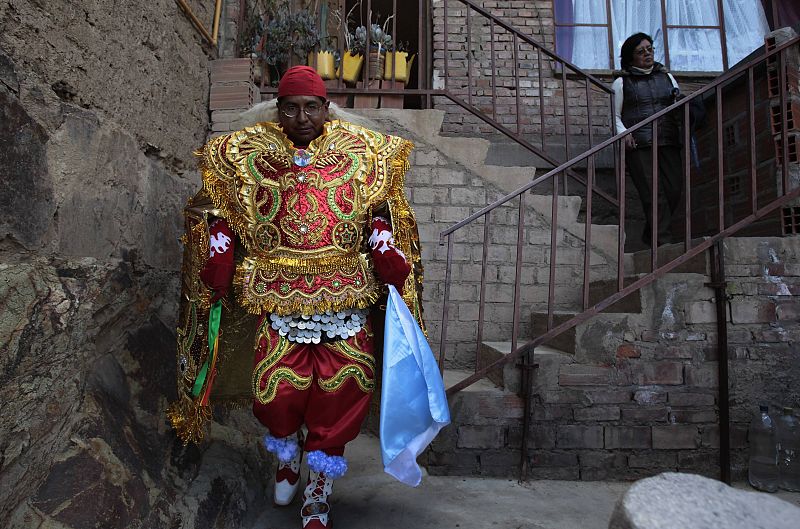 Antezana, 35, member of " Diablada Urus" leaves his home to participate in the Carnival parade