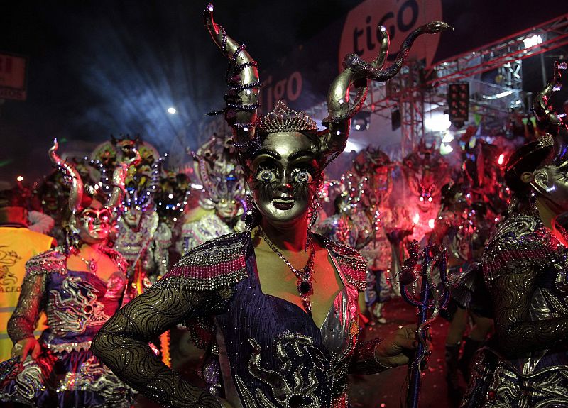 Members of "Diablada Urus" perform during the Carnival parade in Oruro