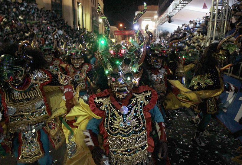 Members of "Diablada Urus" perform during the Carnival parade in Oruro