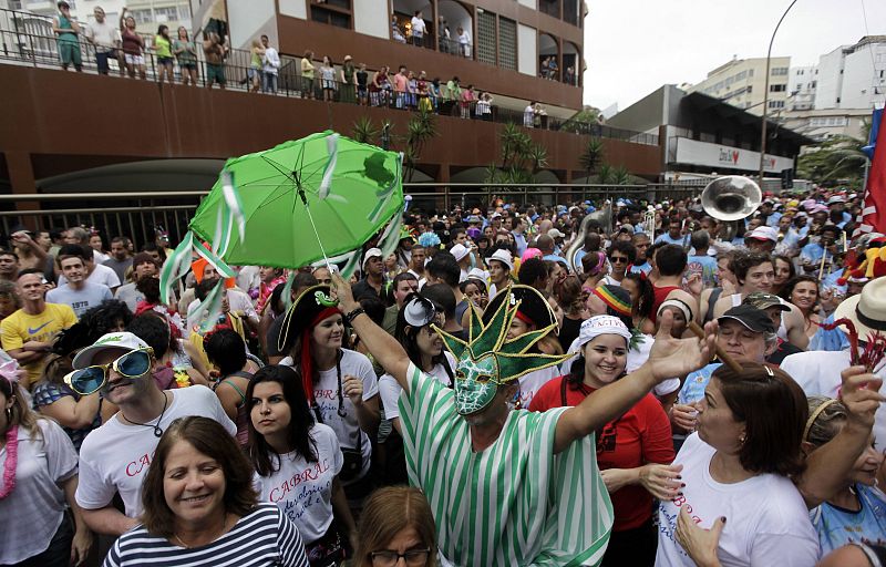 Revellers participate in an annual block party known as the "Banda de Ipanema" in Rio de Janeiro