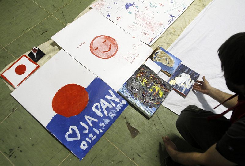 An artist makes an artwork in a gallery in Sarajevo