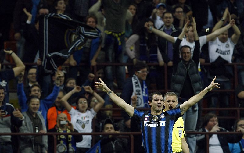 Inter Milan's Stankovic celebrates after scoring against Schalke 04 during the first leg of their Champions League quarter-final soccer match in Milan