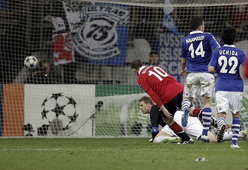 Rooney of Manchester United scores a goal during their Champions League semi-final first leg soccer match against Schalke 04 in Gelsenkirchen