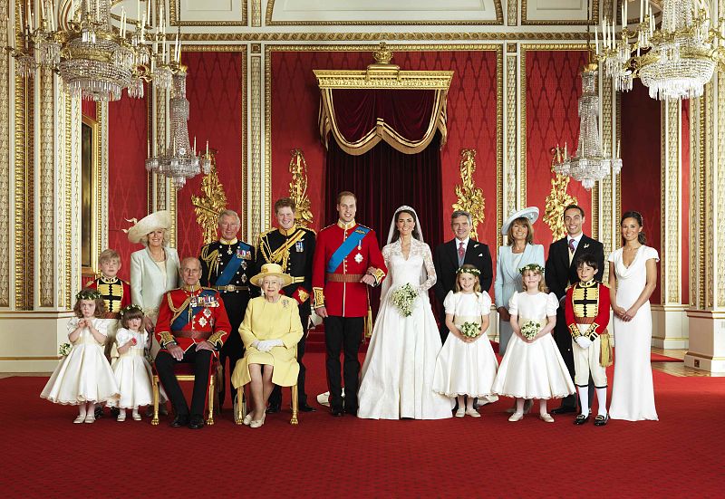 Britain's Prince William and his bride Catherine, Duchess of Cambridge, pose for an official photograph, with their families, on the day of their wedding, in the throne room at Buckingham Palace, in central London