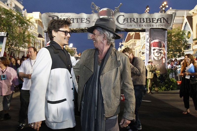 Depp greets co-star Richards at the premiere of "Pirates of the Caribbean: On Stranger Tides" at Disneyland in Anaheim