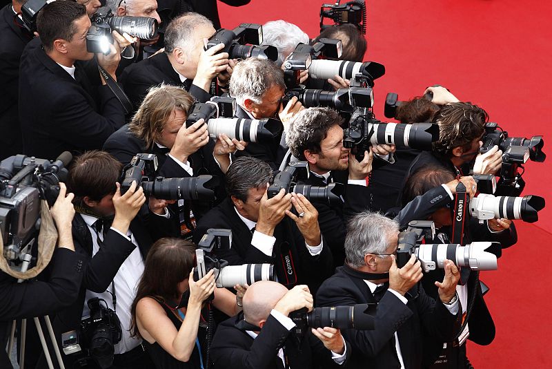 Press photographers take pictures ahead of the screening of the film Habemus Papam in competition at the 64th Cannes Film Festival