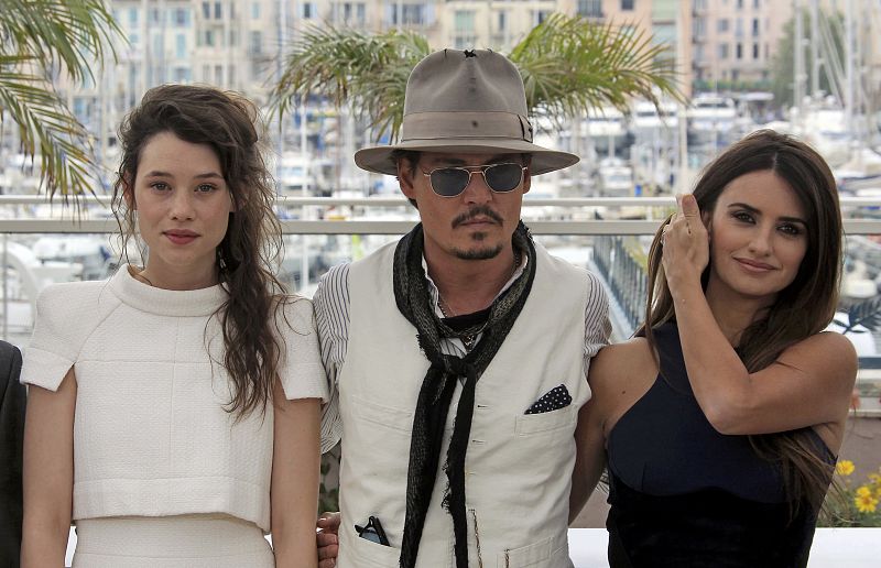 Cast members Depp, Cruz and Berges-Frisbey pose during a photocall for the film "Pirates Of The Caribbean: On Stranger Tides" at the 64th Cannes Film Festival