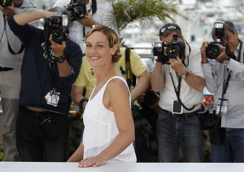 Actress De France poses during a photocall for the film Le Gamin au velo" in competition at the 64th Cannes Film Festival