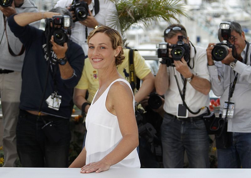 Actress De France poses during a photocall for the film Le Gamin au velo" in competition at the 64th Cannes Film Festival