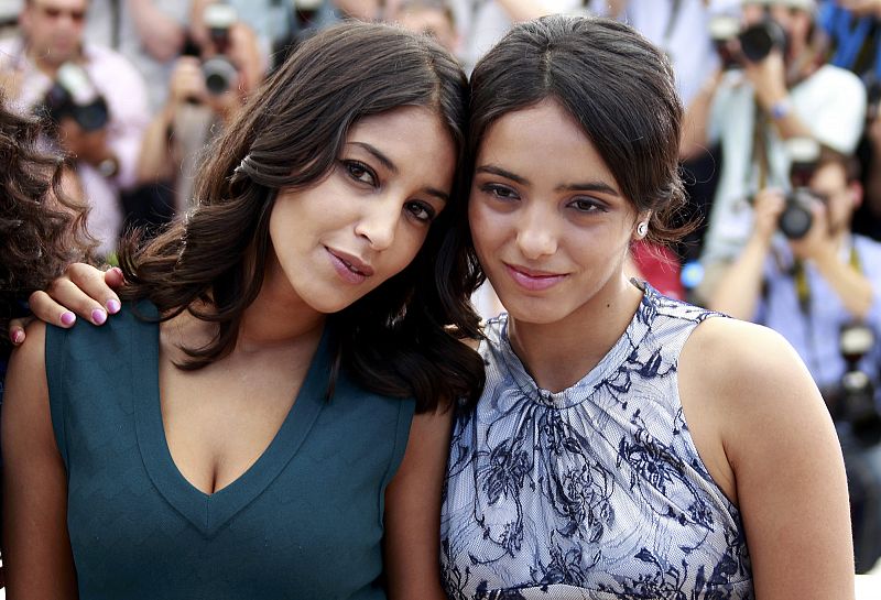 Cast members Bekhti and Herzi pose during a photocall for the film La Source des Femmes at the 64th Cannes Film Festival