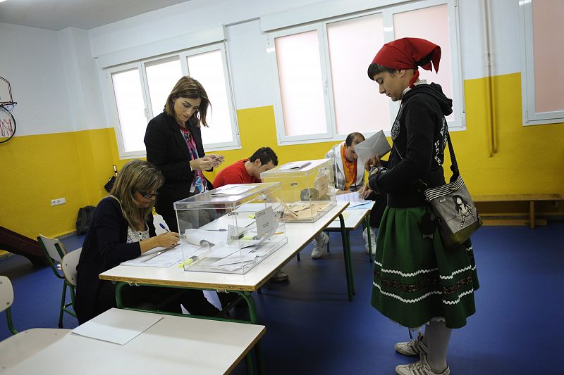 A woman votes during local and municipal elections in Barakaldo