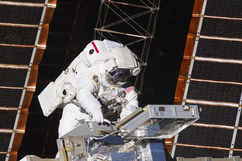 NASA astronaut Andrew Feustel works outside the International Space Station