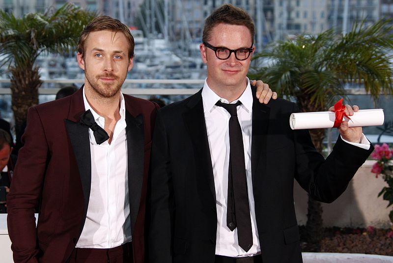 El director Nicolas Winding Refn (derecha) y el actor Ryan Gosling. Su película, 'Drive', se ha llevado el premio a mejor director.