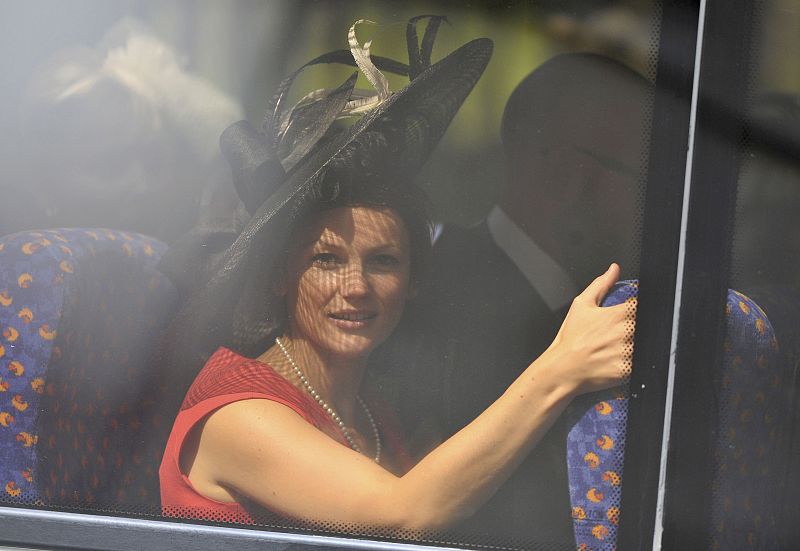 A guest arrrives for the wedding between Britain's Zara Phillips and Mike Tindall at Canongate Kirk in Edinburgh