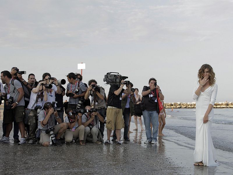 Actress Puccini poses for photographers in Venice.