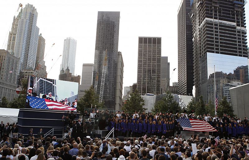 U.S. President Obama delivers remarks as first lady Michelle, former President W. Bush and former first lady Laura look on during ceremonies marking the 10th anniversary of the 9/11 attacks on the World Trade Center, in New York