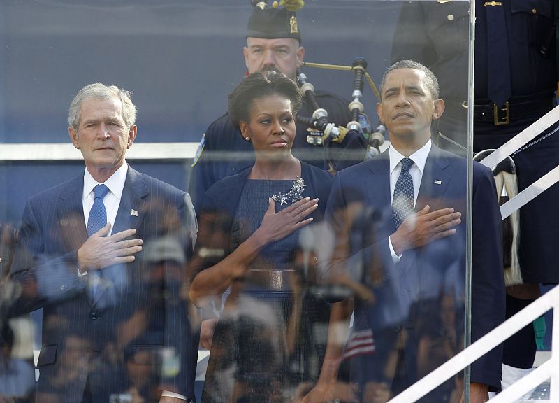 US President Obama holds his hand over his heart for national anthem during ceremonies marking 10th anniversary of 9/11 attacks on World Trade Center, in New York