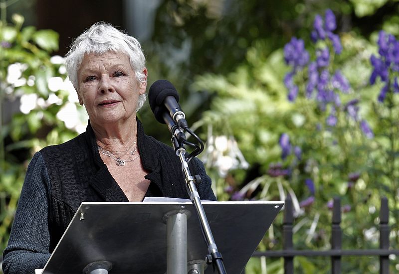 British actress Dench gives reading to friends and family of victims of attacks on World Trade Centre in New York, near U.S. embassy in London