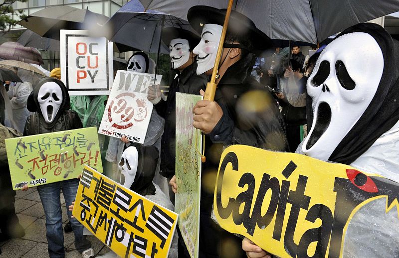 Protesters attend the "Occupy Seoul" rally in front of the Financial Supervisory Commission main office in Seoul