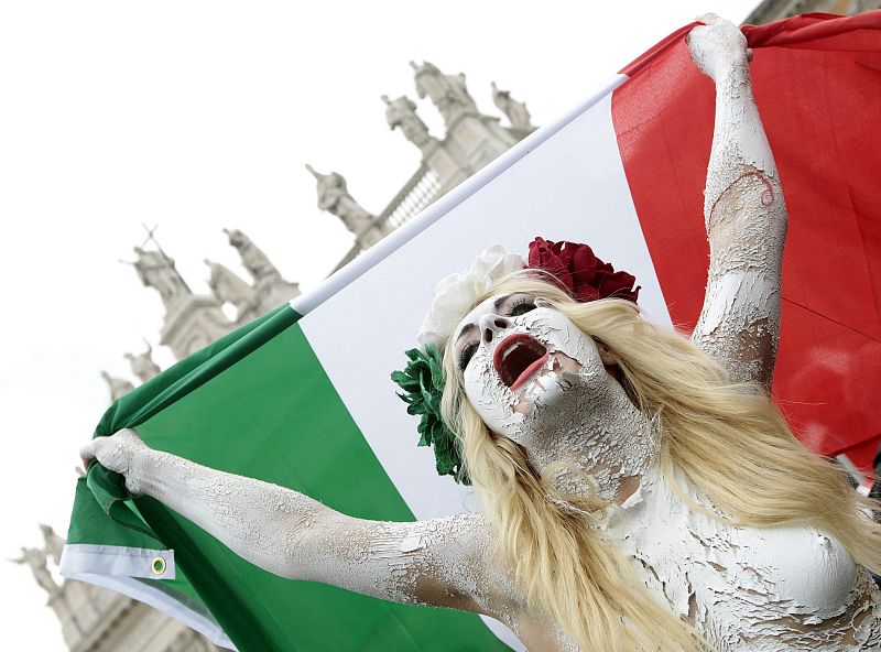 An activist of Feman, a Ukrainian protest group against discrimination on women, performs during a protest by the centre-left PD party against Italian Prime Minister Silvio Berlusconi, in front of the San Giovanni Basilica in Rome