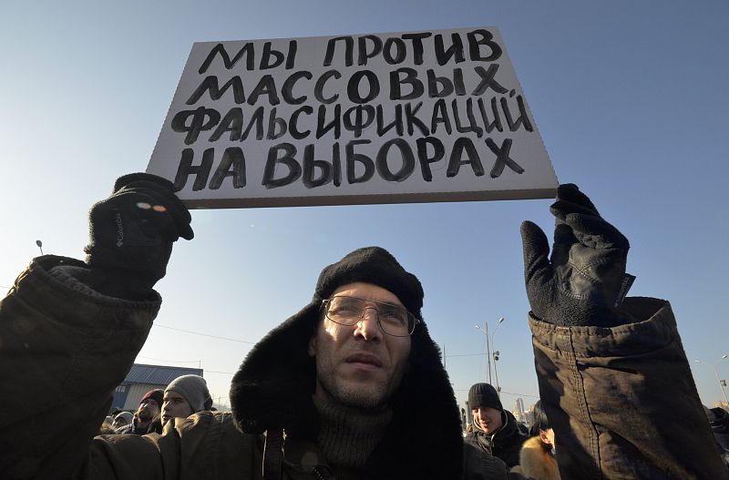 Opposition activists hold a rally to protest against violations during the parliamentary elections in Vladivostok