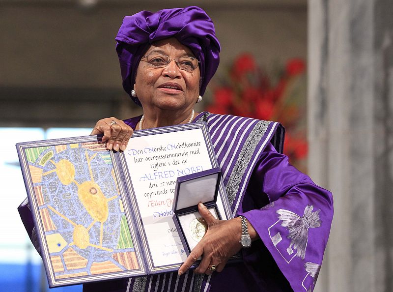 Nobel Peace Prize winner, Liberian President Ellen Johnson-Sirleaf, poses with her award at the award ceremony in Oslo