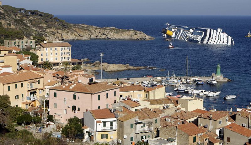 A cruise ship that ran aground is seen off the west coast of Italy at Giglio island