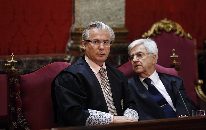 Spanish judge Baltasar Garzon sits in the dock in the Supreme Court at the start of his trial in Madrid