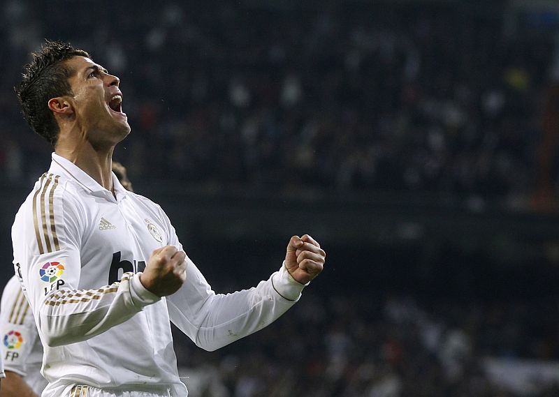 Real Madrid's Ronaldo celebrates after scoring against Barcelona during their Spanish King's Cup soccer match in Madrid