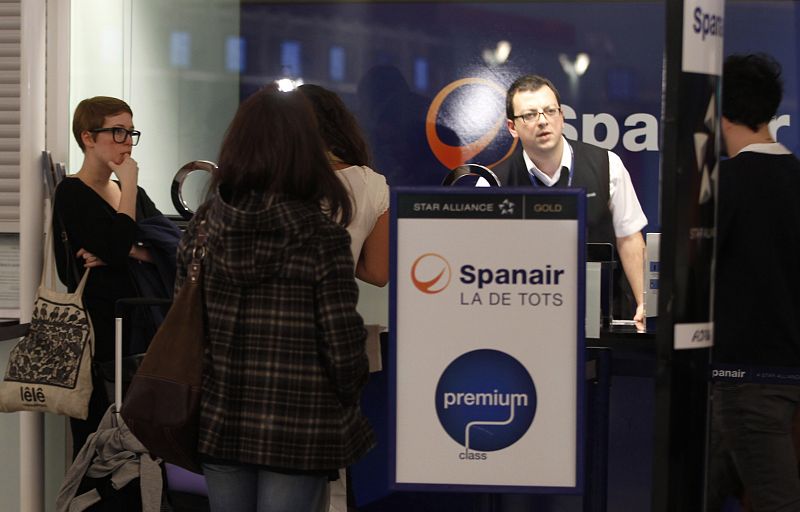 Passengers in front of Spanair's desk at Barcelona's airport near Barcelona