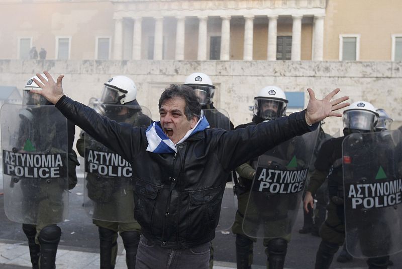 a man shouts during a huge anti-austerity demonstration in Athens' Syntagma square