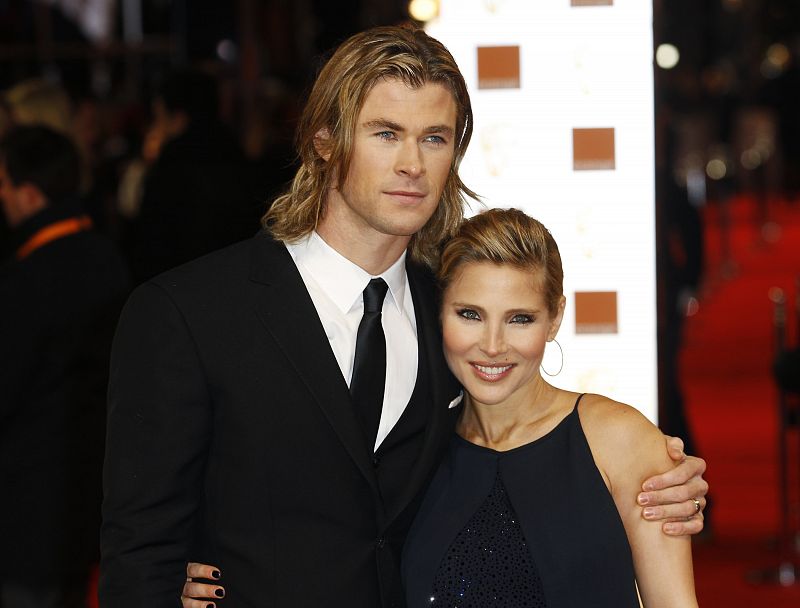 Actress Elsa Pataky and her husband Chris Hemsworth arrive for the BAFTA awards ceremony at the Royal Opera House in London