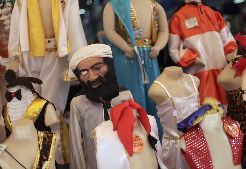 An Osama Bin Laden carnival mask is displayed for sale at a popular market in Rio de Janeiro