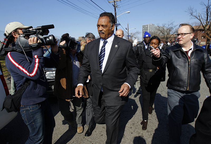 Reverend Jesse Jackson walks to the New Hope Baptist Church for the funeral service for the late singer Whitney Houston in Newark