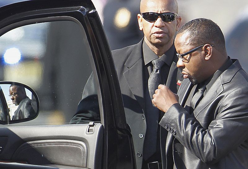 Brown leaves funeral service of ex-wife, pop singer Houston, at New Hope Baptist Church in Newark