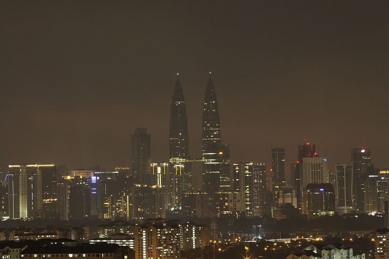 Petronas Twin Towers in Kuala Lumpur are pictured after lights were turned off for Earth Hour