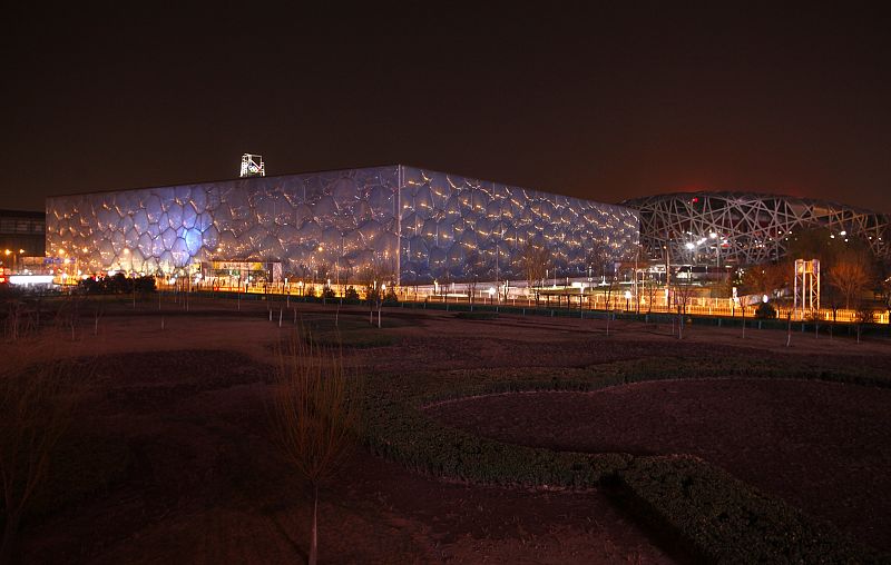 China's National Stadium and National Aquatics Center are seen during Earth Hour in Beijing