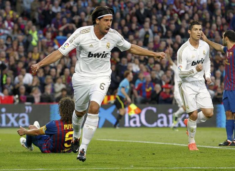 Real Madrid's Khedira celebrates after scoring against Barcelona during their Spanish first division soccer match in Barcelona