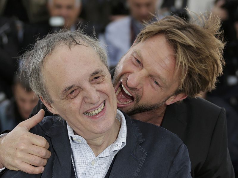 Director Argento poses with cast member Kretschmann during a photocall at the 65th Cannes Film Festival