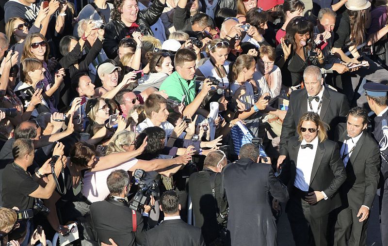 Cast member Pitt arrives on the red carpet ahead of the screening of the film Killing Them Softly in competition at the 65th Cannes Film Festival