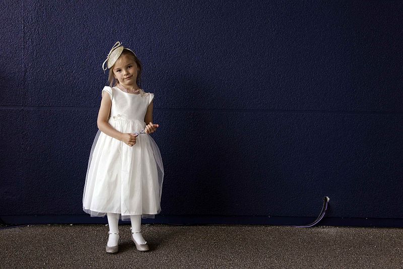 Racegoer Anastasia poses for a photograph during the first day of racing at Royal Ascot in southern England