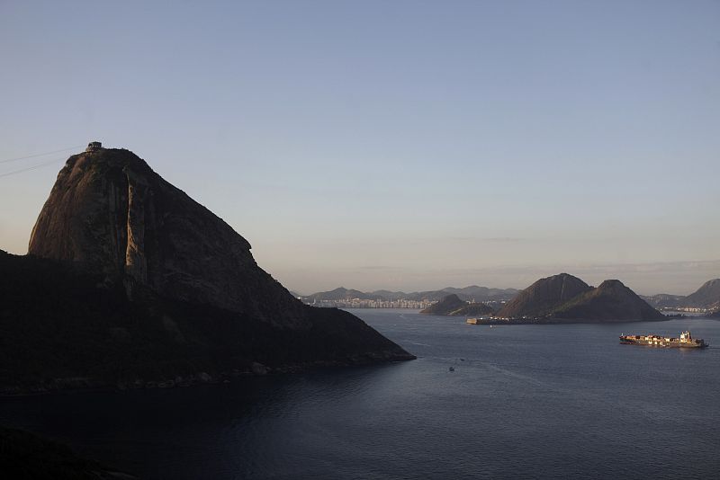 A ship navigates Guanabara Bay next to the famous Sugar Loaf mountain in Rio de Janeiro