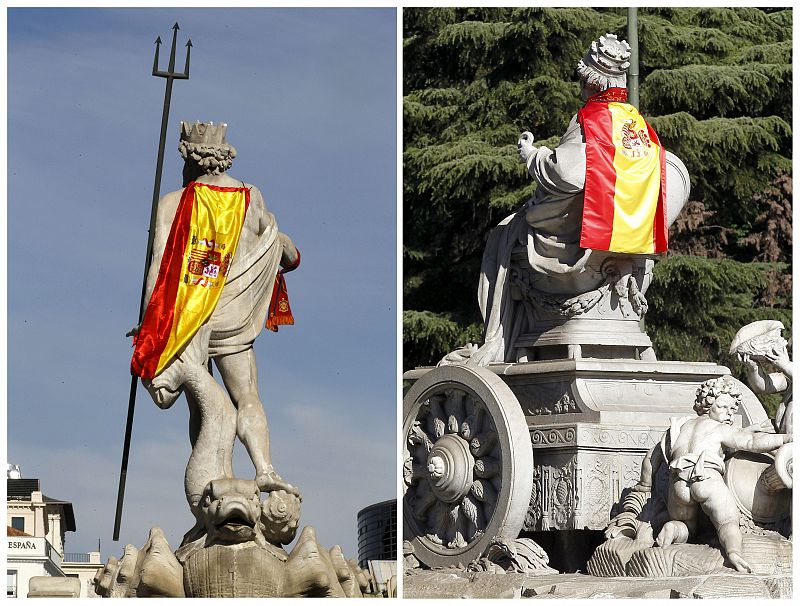 Las fuentes de Neptuno y de La Cibeles, adornadas con la bandera de España en honor a la selección española de fútbol.