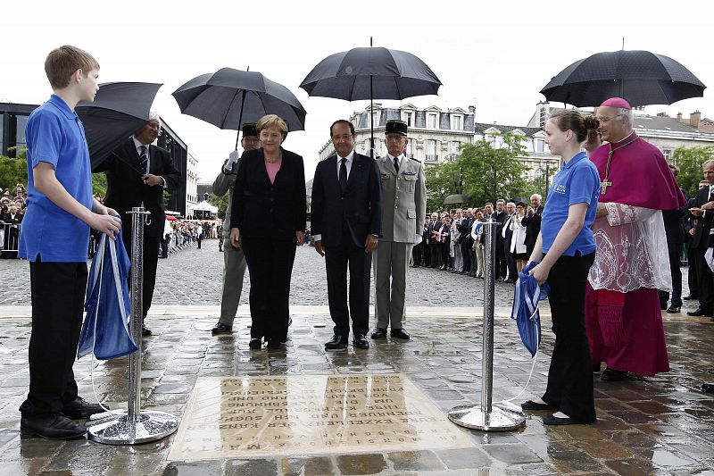 France's President Hollande and Germany's Chancellor Merkel attend the 50th anniversary ceremony of a reconciliation meeting in Reims
