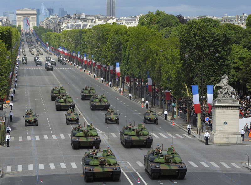 French AMX-56 Leclerc battle tanks ride down Champs Elysees during the traditional Bastille Day military parade in Paris