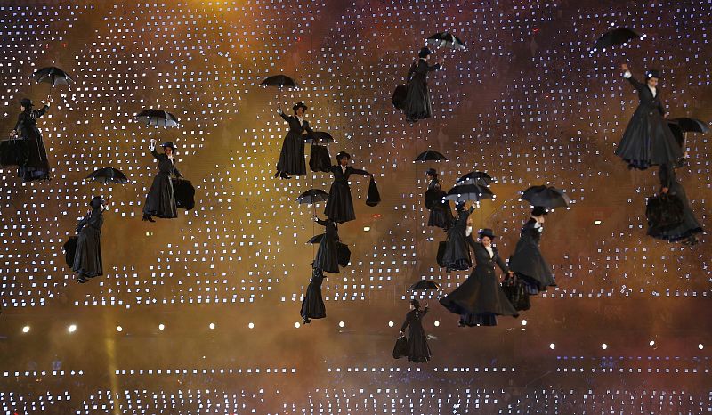 Performers dressed as character Mary Poppins descend to ground during opening ceremony of London 2012 Olympic Games at Olympic Stadium