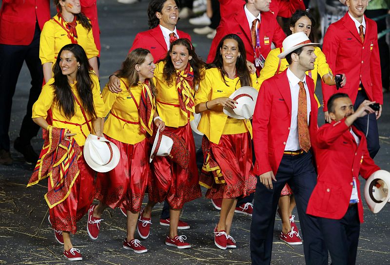 Members of Spain's contingent take part in the athletes parade during the opening ceremony of the London 2012 Olympic Games at the Olympic Stadium