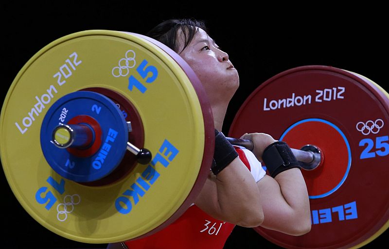 North Korea's Chun Hwa Ryang competes on the women 48Kg Group A weightlifting competition at the London 2012 Olympic Games